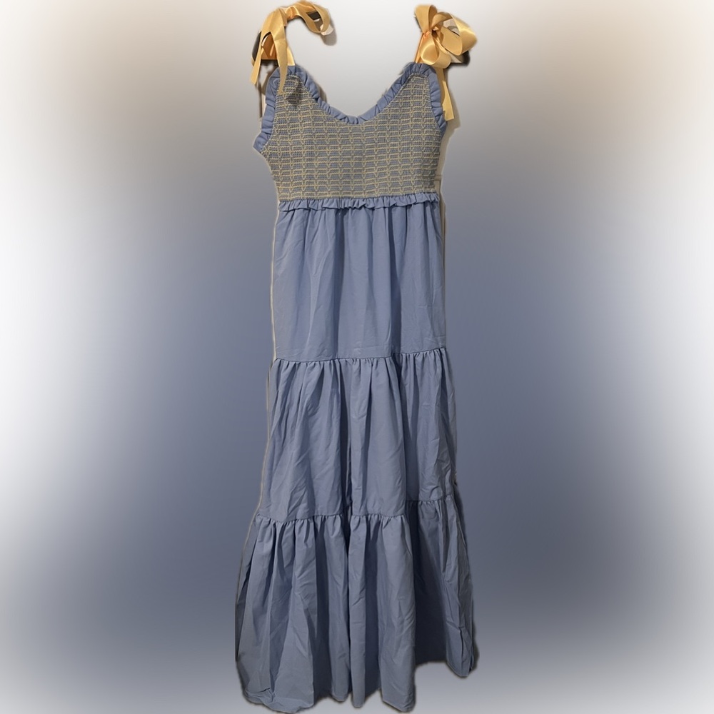 Never worn beautiful dress. Size M-L.
